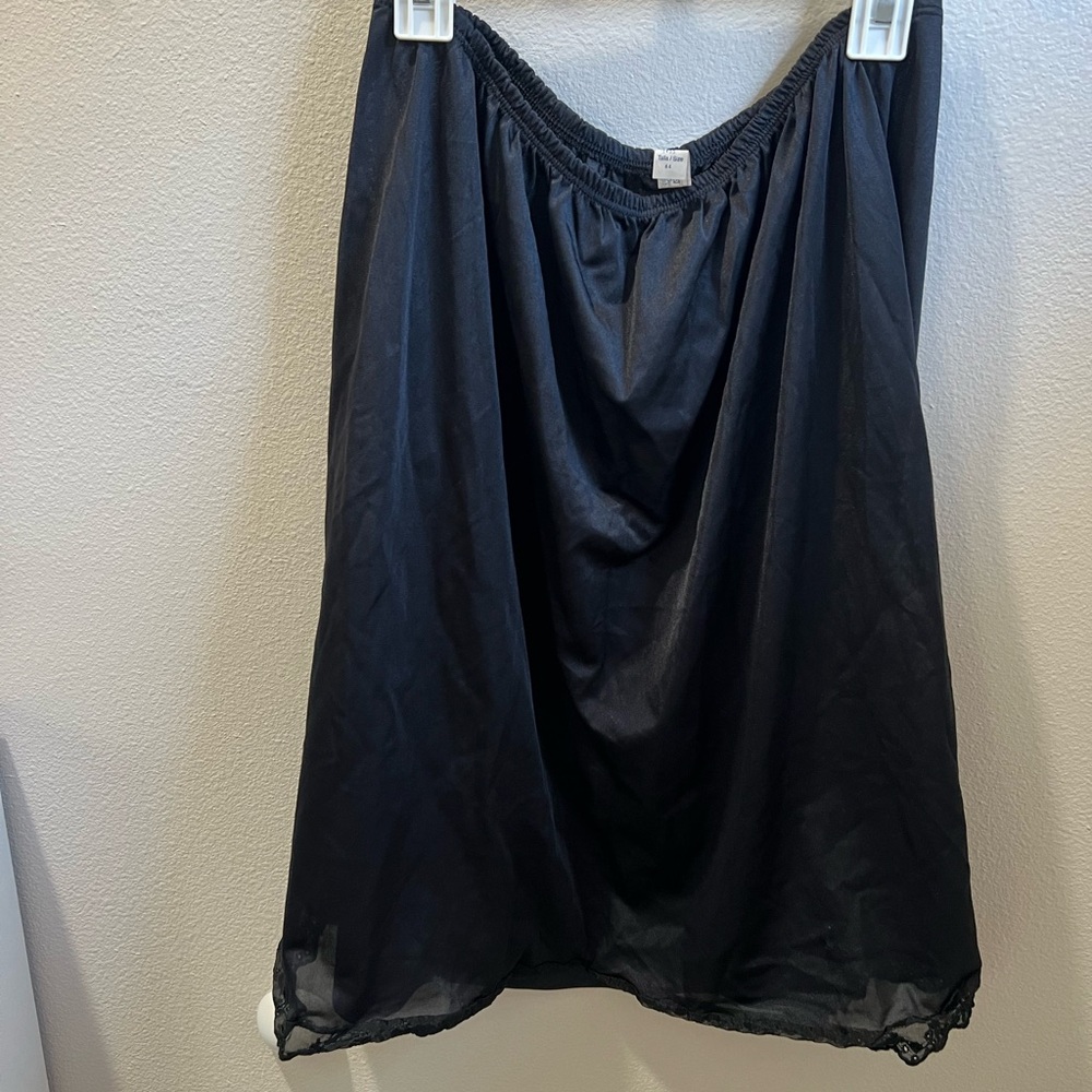 Vandioria vintage black slip with‎ lace trim in front. Size 44